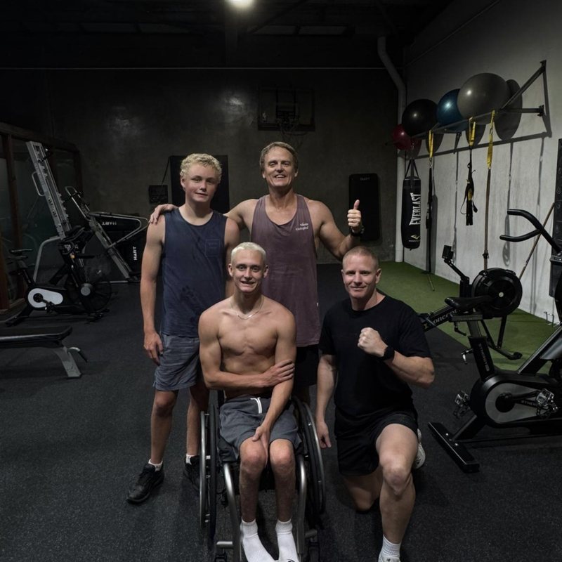 Kai with his training crew at the gym